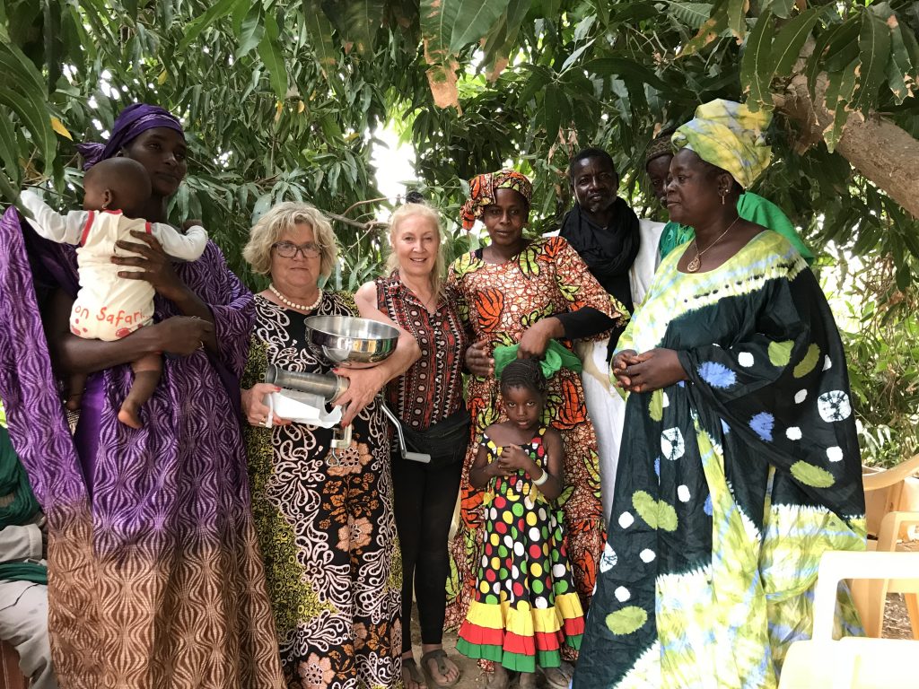 Pellicano with women of the Guédé Chantier community in Senegal